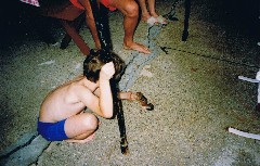Ben Dorrough; with Chipmunk at camp at Moussam Lake in Maine